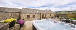 Sunrise Barn enclosed private rear garden with luxury hot tub